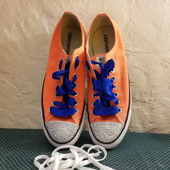 hyper orange chuck taylors